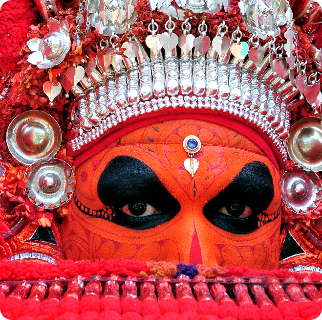 Artist Performing Theyyam - Dance of sangam Cultural 